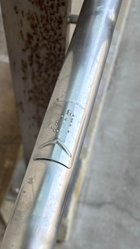 Accessible Ramp with Braille Tactile Handrail Button