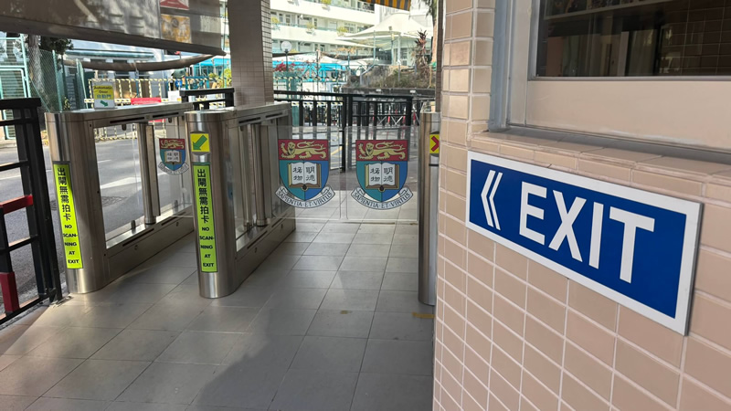 Wide pedestrian gate with accessible controls allowing wheelchair access